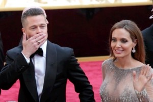 Brad Pitt and Angelina Jolie arrive at the 2014 Academy Awards